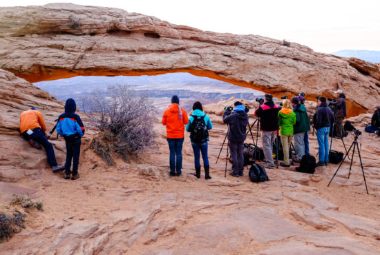 Photographers at Mesa Arch, Canyonlands NP, Utah